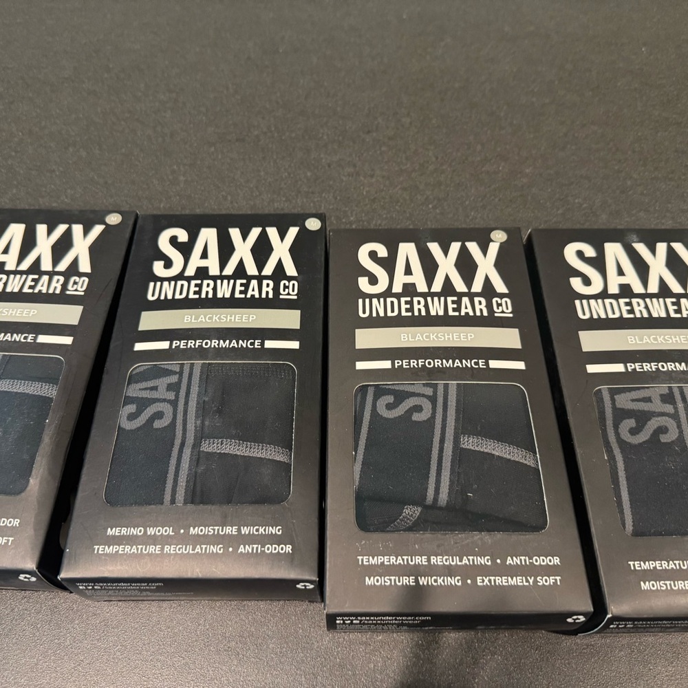 4 pairs Saxx Men’s black boxer briefs